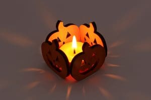 Pumpkin illuminated by a candle within.